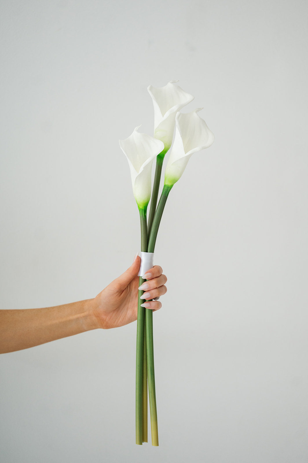 white calla lilies bouquet Petite Calla Lily Bouquet – Forever Floral Co